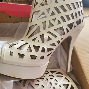 Platform caged ankle boot